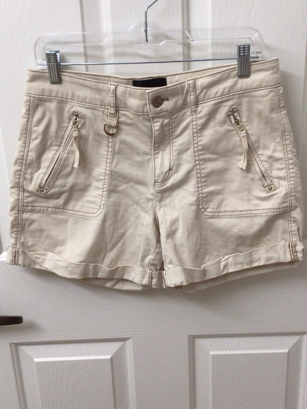 WHBM tan/ khaki mid rise shorts size 6